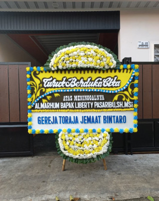 Papan Bunga Duka di Siak Kecil